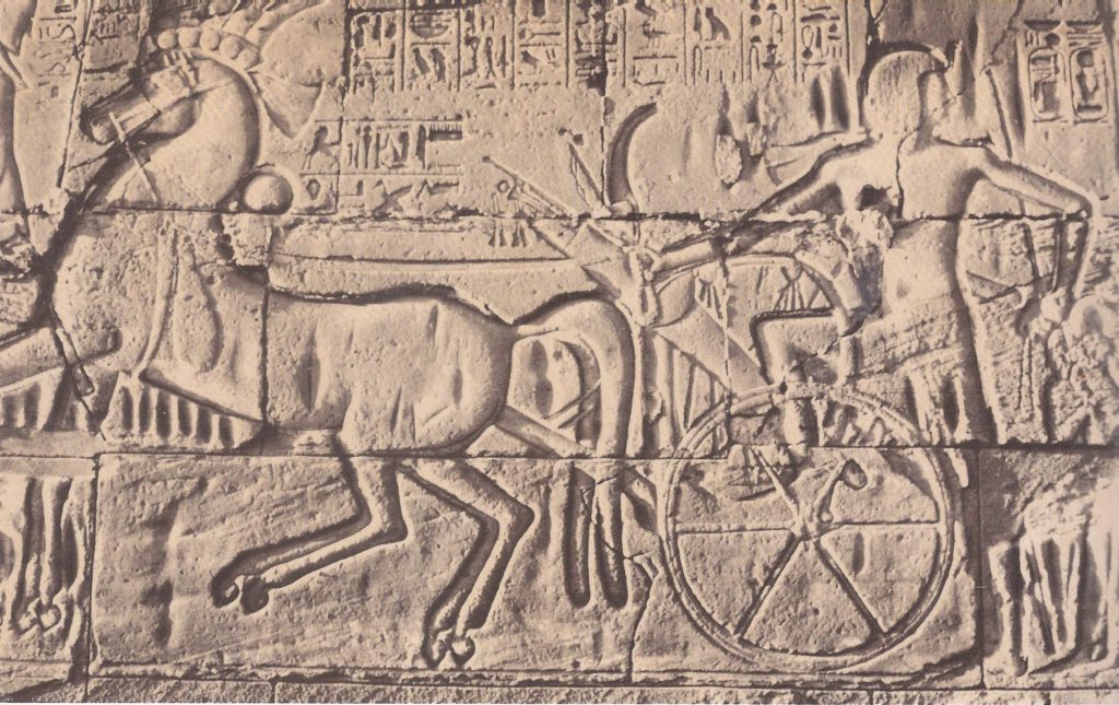 An Egyptian war-chariot of the type used in the pursuit of the Hebrews. According to Hebrew tradition, the Egyptian army was drowned in the Red Sea, through which the Israelites had miraculously passed dry-shod. The feast of the Passover annually commemorates the Israelite Exodus from Egypt. The picture shows the Pharaoh Seti I: it is carved on the wall of the Temple of Amun at Karnak (ancient Thebes). 